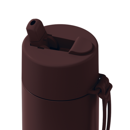 Close-up of a dark brown insulated water bottle with a flip-straw lid and carrying strap on a solid white background.
