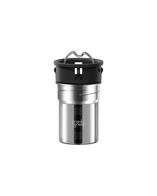 All | A stainless steel travel tumbler with a black lid and a metal carrying loop, featuring the 'frank grill' logo on the front, set against a plain white background.