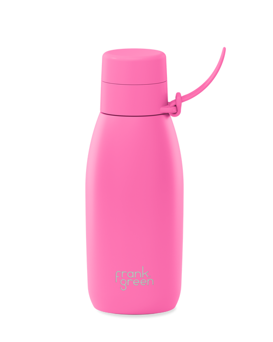 Bubblegum | A bright pink 34oz insulated water bottle with a thermal lid and carry strap.