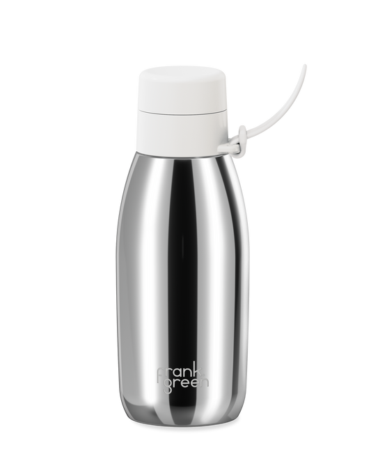 Chrome Silver | A polished stainless steel 34oz insulated water bottle with a white thermal lid and carry strap.