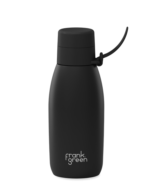 Graphite | A matte black 34oz insulated water bottle with a thermal lid and carry strap.