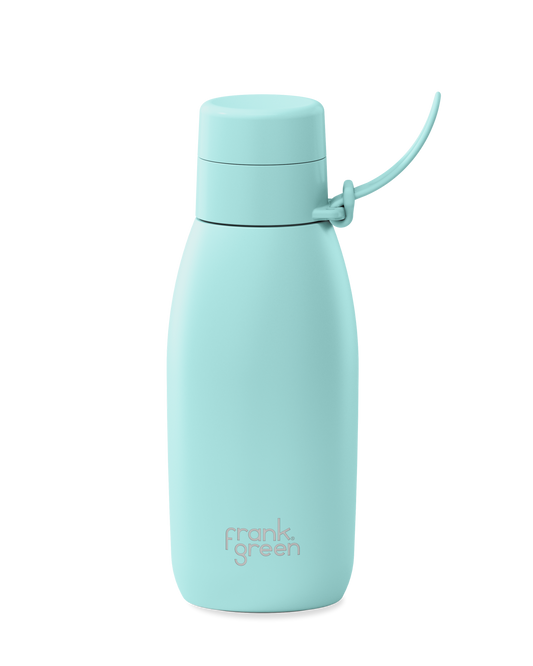 Peppermint | A mint green 34oz insulated water bottle with a thermal lid and carry strap.