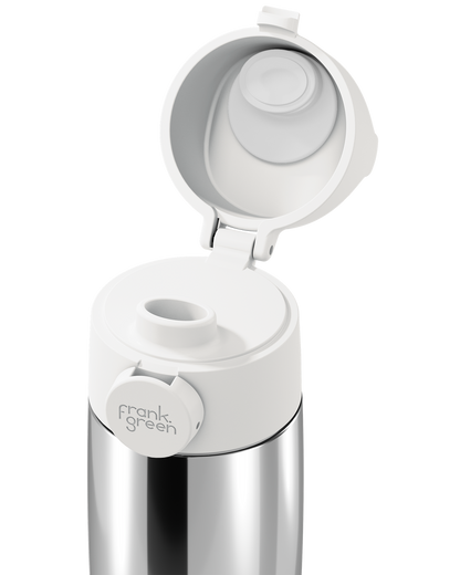 Close-up of a white Grip & Sip lid on a polished stainless steel 12oz insulated bottle, with the sip cap flipped open to show the spout.
