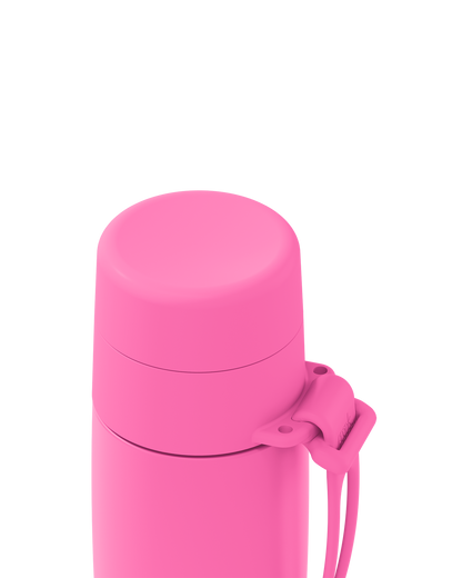 close-up of a bright pink vacuum-insulated bottle or tumbler with a matching pink lid and carrying strap, shown on a plain white background.