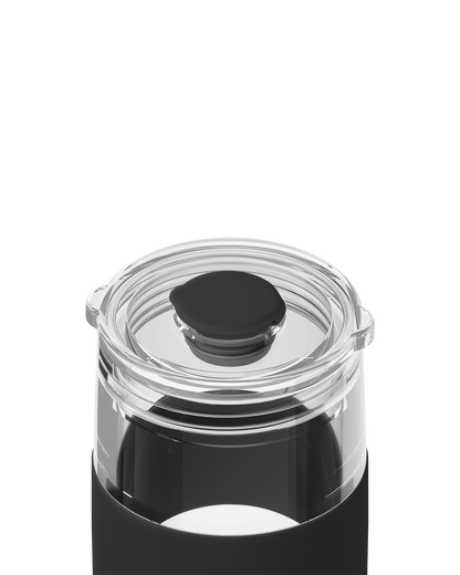 Close-up of a black insulated bottle or tumbler with a clear screw-on lid and black top insert, shown on a white background.