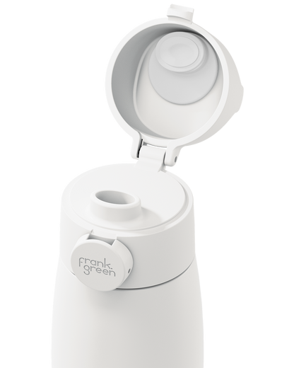 Close-up of a white grip handle lid flipped open on the matching bottle, showing the white inner seal, drinking spout, and circular 'frank green' logo tab on a plain white background.