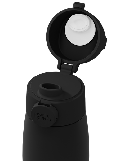 Close-up of a matte black grip handle lid flipped open on the matching bottle, showing the white inner seal, drinking spout, and circular 'frank green' logo tab on a plain white background.
