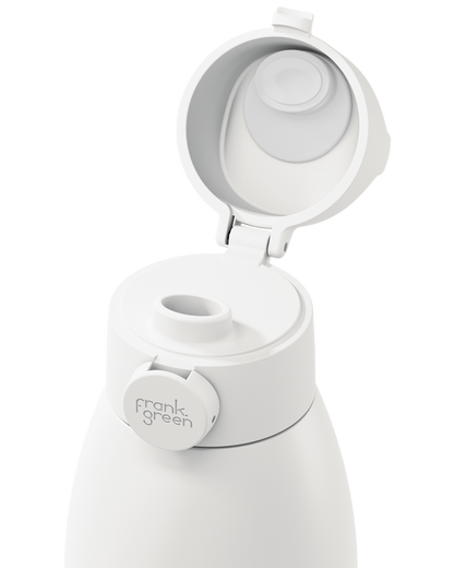Close-up of a white reusable bottle with its flip-top lid open, showing the interior and a round white cap labeled 'frank green' on a clean white background.