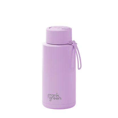 A light purple insulated water bottle with a matching lid and carrying loop, featuring the 'frank green' logo near the bottom, set against a plain white background.