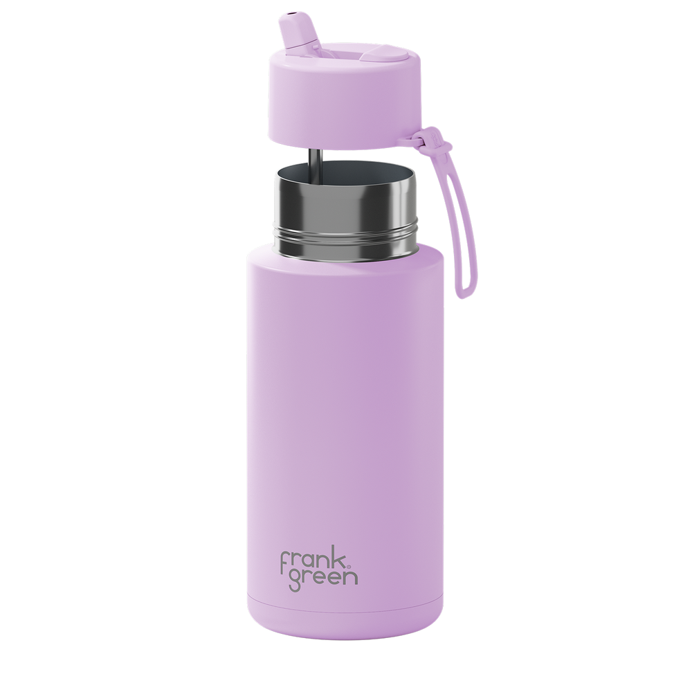 A light purple insulated water bottle with a matching purple lid and carry loop, featuring a stainless steel rim and the 'frank green' logo near the bottom, set against a plain white background.