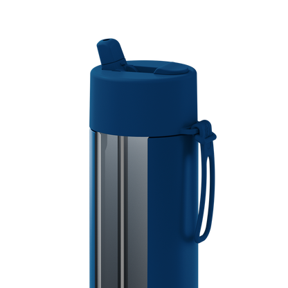 A close-up of a travel tumbler with a dark blue silicone lid, carrying loop, and handle, paired with a brushed stainless steel body, shown on a solid white background.