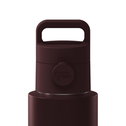Close-up of a dark brown insulated bottle lid with a carry handle and a circular Frank Green logo, shown on a plain white background.